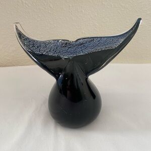 Glass whale tail paperweight